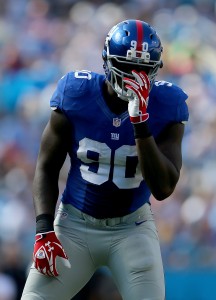 CHARLOTTE, NC - SEPTEMBER 22: Jason Pierre-Paul #90 of the New York Giants during their game at Bank of America Stadium on September 22, 2013 in Charlotte, North Carolina. (Photo by Streeter Lecka/Getty Images)